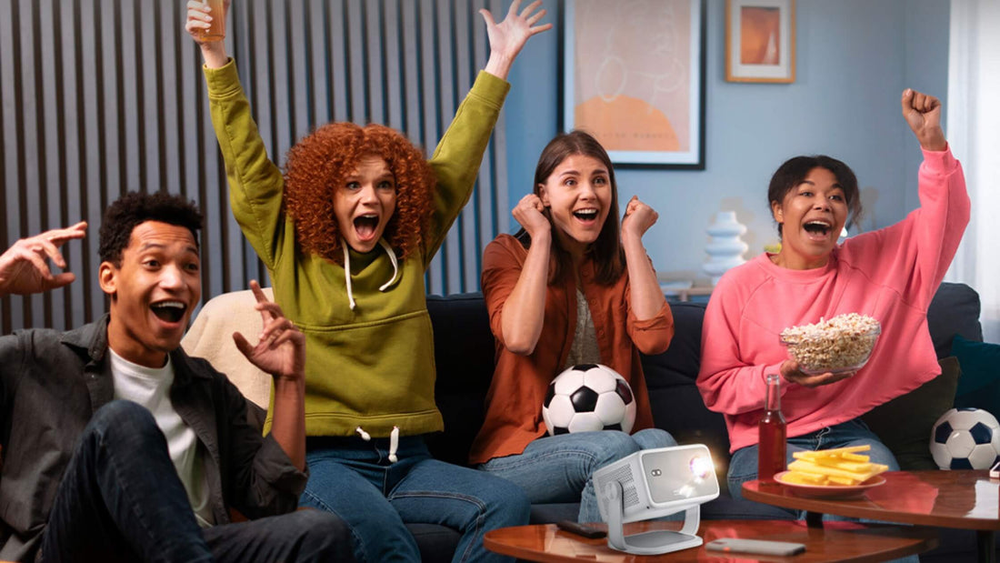 Group of friends watching sports on Vision Beam Pro 2 projector, cheering together at home
